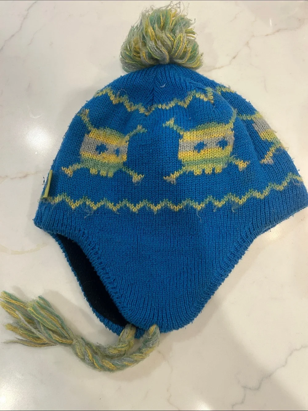 Kids Blue Knit Earflap Hat with Yellow Pattern and Pom